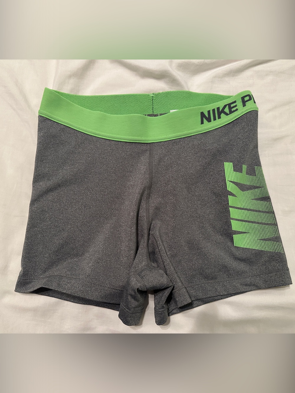 Nike Women’s Charcoal Athletic Shorts with Lime Green Waistband